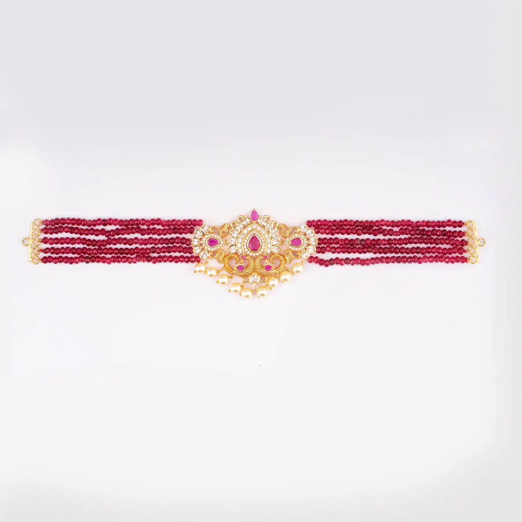 Red beaded ruby choker with peacock stone pendant